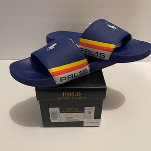 Brand new grade school polo slides